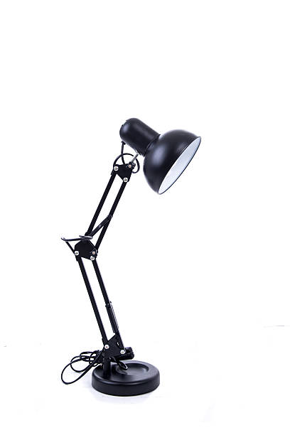 istock Vintage black desk lamp isolated on white 494470464