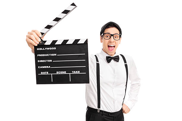 istock Excited movie director holding a clapperboard 494475350