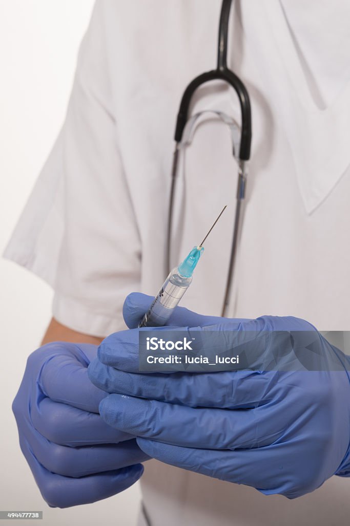 Syringe and clinical analysis 2015 Stock Photo