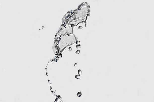 istock bizarre fountain of drops on blurred background 494477832