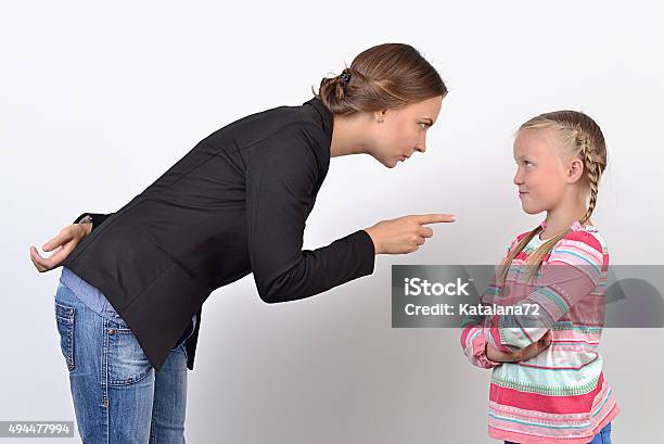 Mother And Daughter Having Quarrel Stock Photo - Download Image Now - 2015, Adult, Females