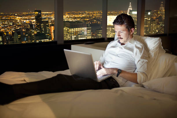 istock Man working until late in New York 494478006