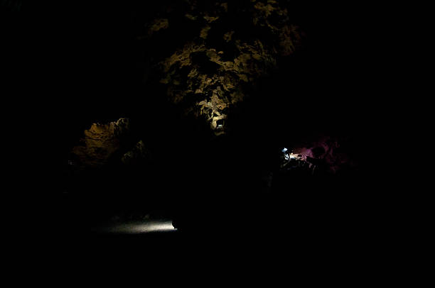 beautiful spotlights in black cavern