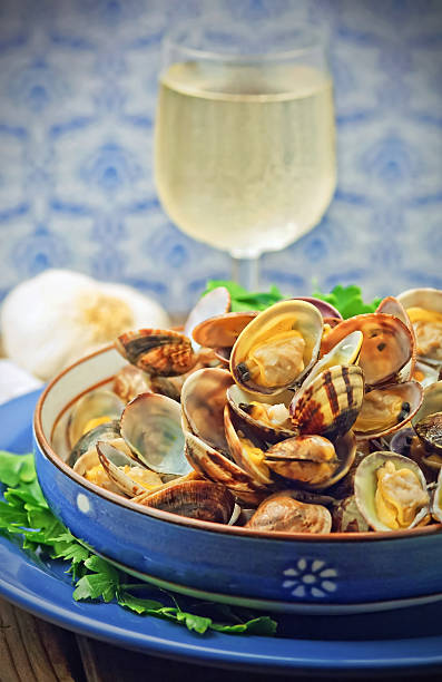 istock Clams soup with fresh parsley leaves 494479000