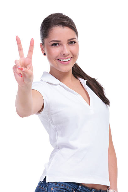 istock casual woman victory sign 494479675