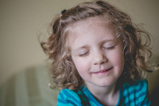 istock Girl with Eyes Closed 494481803