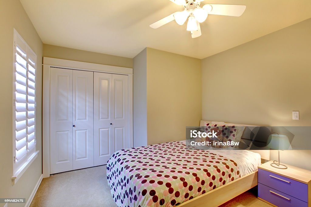 Kids bedroom with minimal modern design. Kids bedroom with minimal design and beige walls. Apartment Stock Photo