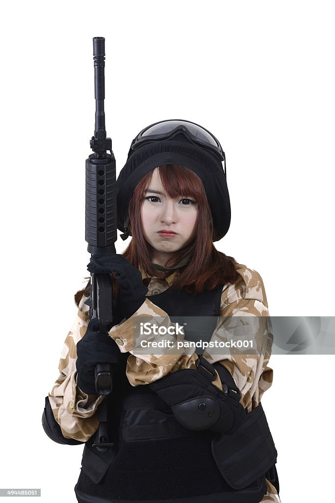 Female soldiers in combat suit holding rifle. Female soldier in combat suit holding rifle on white background. Adult Stock Photo