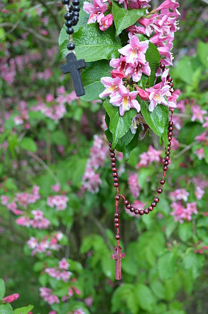 istock Rosaries on a floral background 494485623