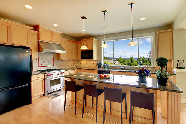 istock Luxury classic wood kitchen with island and chairs. 494486121