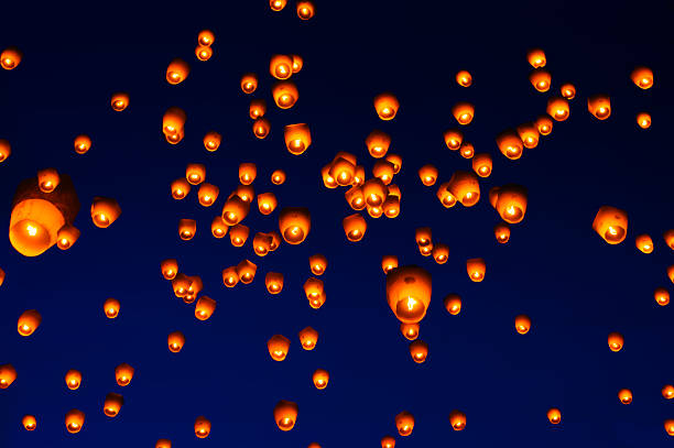 istock Sky lanterns against the sky with blue tone 494486211