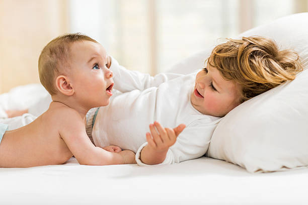 istock Cute little brothers in bedroom. 494495818