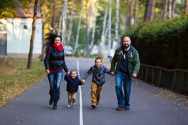 istock Happy family in fall 494496050
