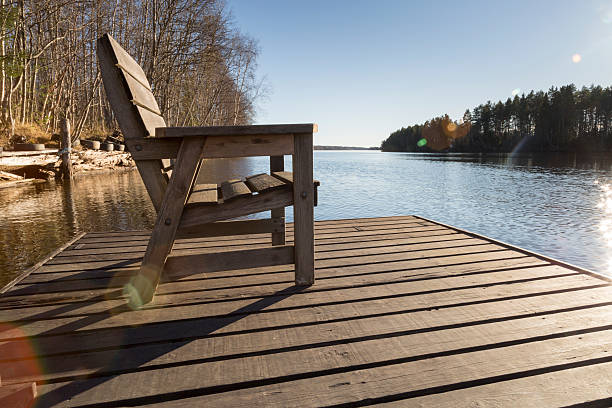 istock Chair on Pier in River 494498006