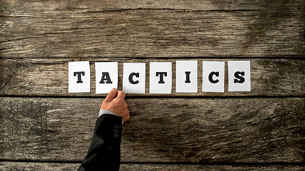 istock Overhead view of strategic business partner assembling the word 494498824
