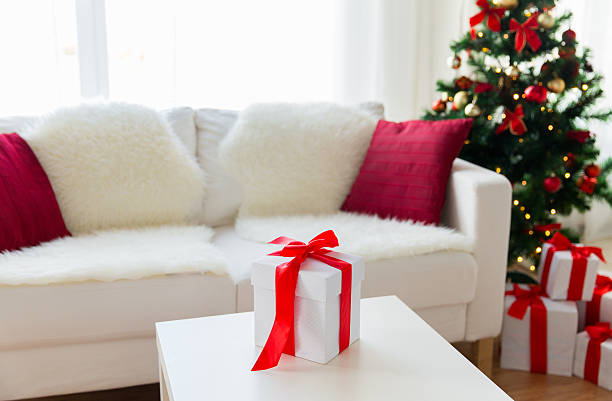 istock close up of christmas gift box on table at home 494499266
