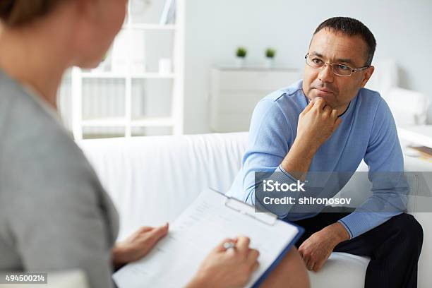 Listening To Psychologist Stock Photo - Download Image Now - Psychotherapy, Alternative Therapy, Mental Health Professional