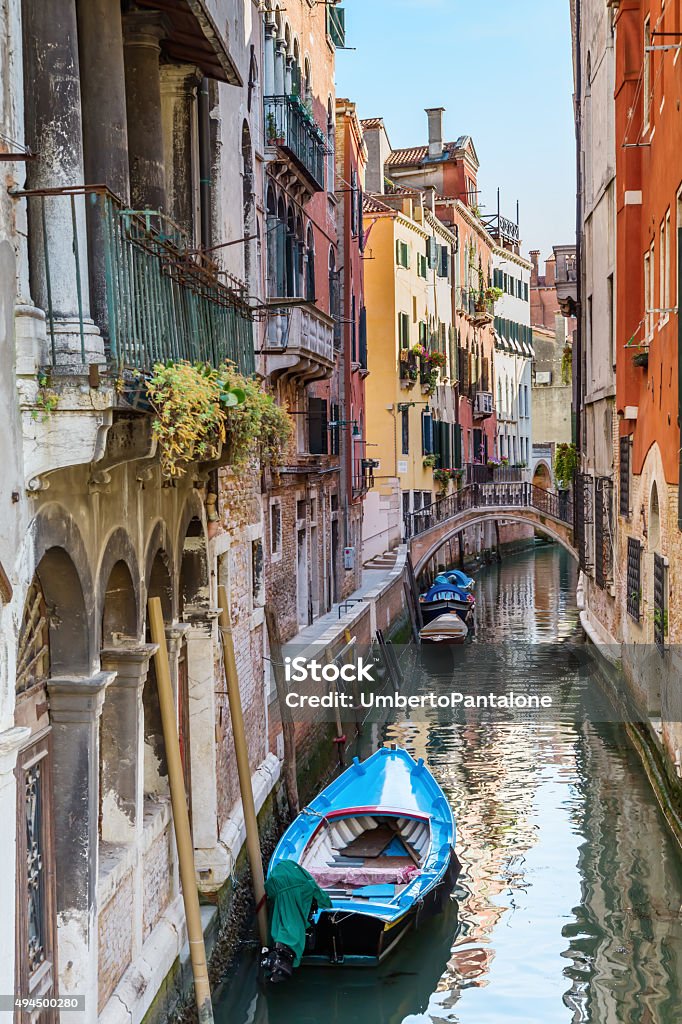 Venice. Urban canal Italy. The cityscape and architecture of Venice. Urban canal and boats on it 2015 Stock Photo