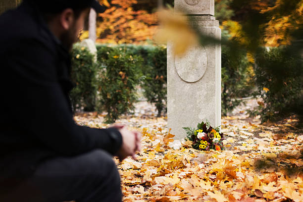 istock Man in the cemetery 494500804