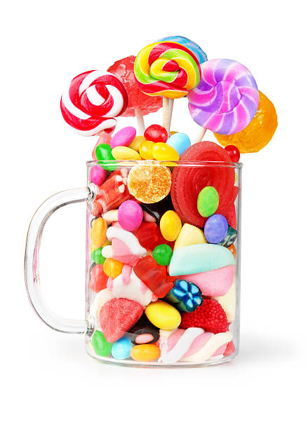 caneca de vidro cheio de rebuçados - lollipop isolated multi colored candy imagens e fotografias de stock