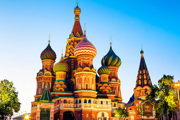 Russian orthodox St. Basil Cathedral illuminated at dusk, Red Square, Moscow, Russia, long exposure with tripod