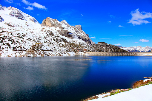 Dolomites italian alpine paradise: Marmolada Glacier, Fedaia Pass lake