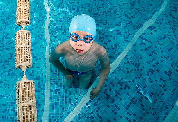 istock Child in swimming pool 494505171