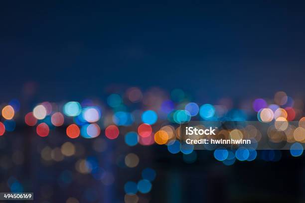 Urban City Night Light Blur Bokeh Defocused Background Stock Photo - Download Image Now