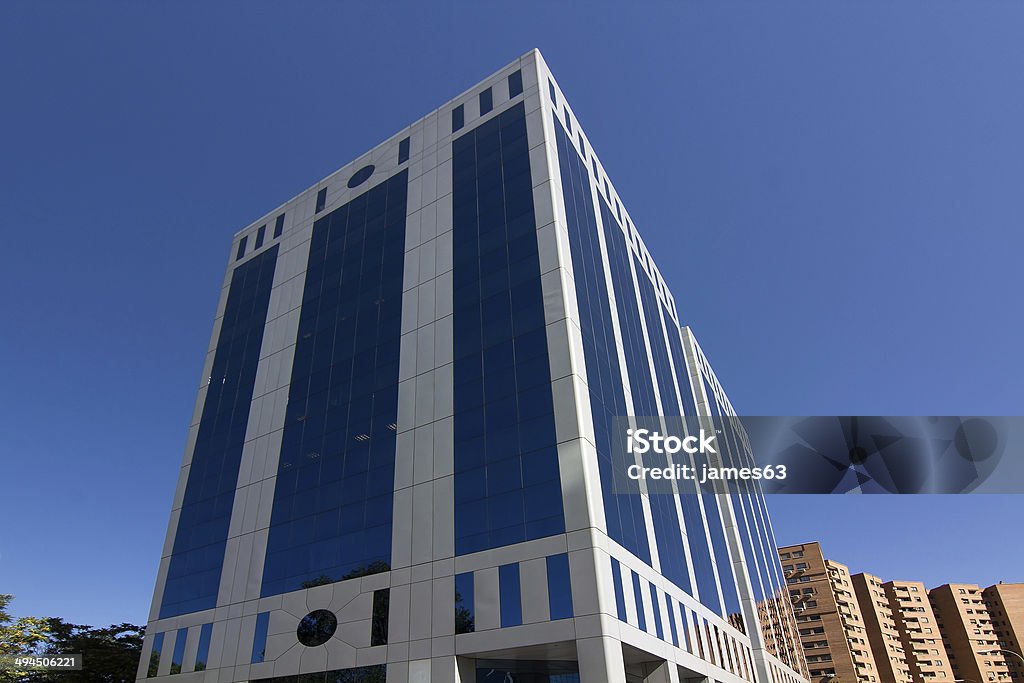 MADRID, SPAIN OCT 15: Modern building with glass architecture on MADRID, SPAIN OCT 15: Modern building with glass architecture on October 15 2012, In one of the most modern financial areas of Madrid, recently premiered this modern complex of offices for rent. Abstract Stock Photo