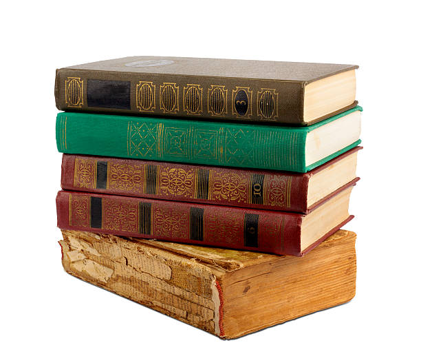 istock stack of old books with gold stamping on  background 494507469