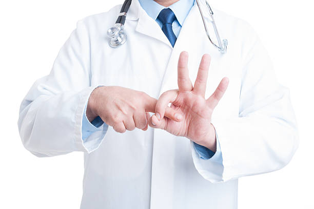 istock Anonymous proctologyst or gynecologist doctor making finger to h 494508090