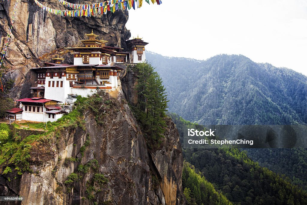 Tiger's Nest at Paro Bhutan Paro Taktsang is the popular name of Taktsang Palphug Monastery (also known as Tiger's Nest), a prominent Himalayan Buddhist sacred site and temple complex, located in the cliff side of the upper Paro valley, in Bhutan.  Bhutan Stock Photo