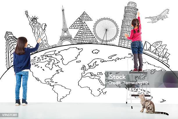 Two Girl Kids Drawing Global Map And Famous Landmark Stock Photo - Download Image Now