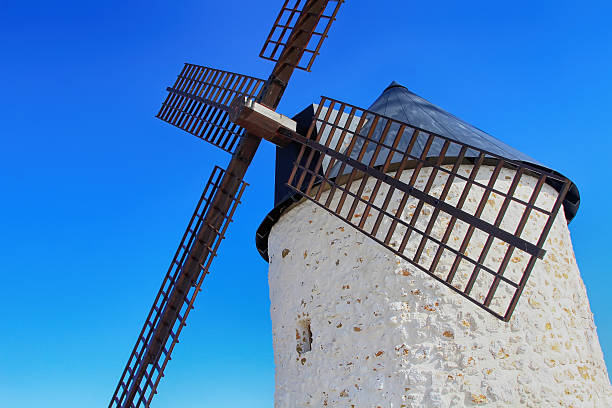 istock old Windmill XVI century white stone and wood 494511639