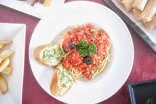 istock Spaghetti Bolognese on white plate 494512259