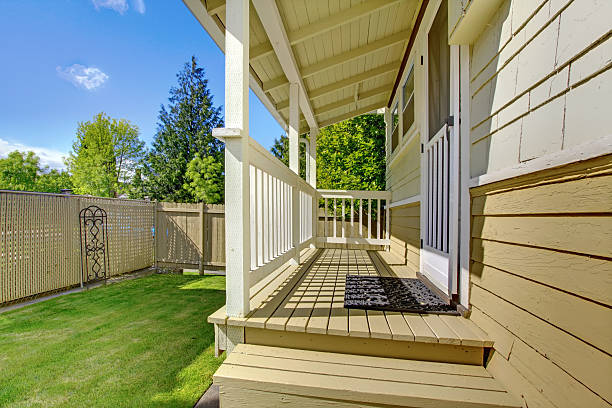 istock Back yard with porch and beige house. 494522077