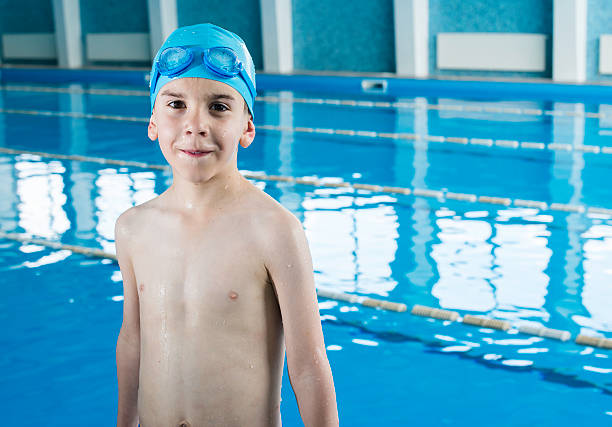 istock Child in swimming pool 494522919