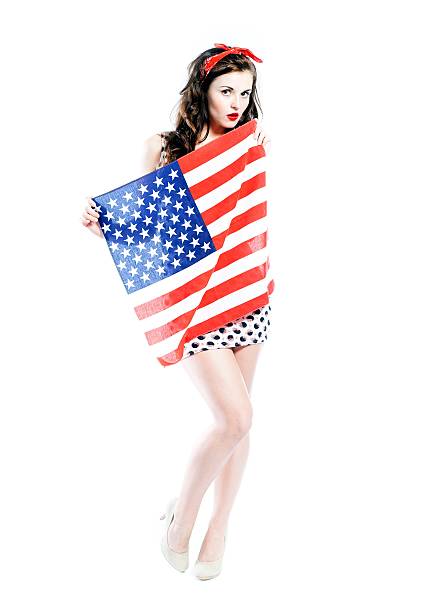 istock Pin up girl posing with american flag 494526023