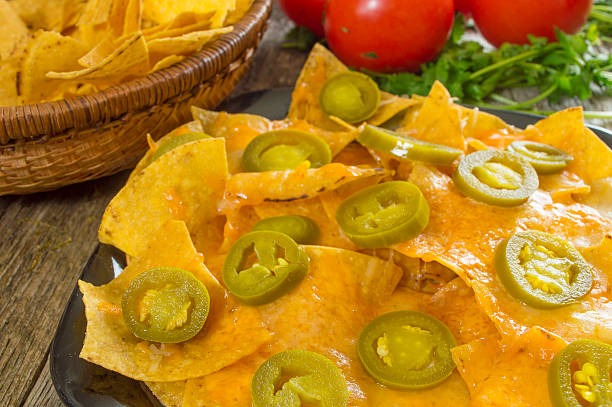 istock heaping pile of nacho chips 494527121