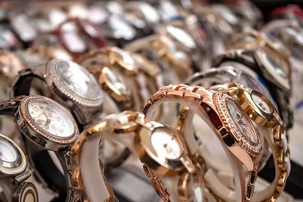 Photo of Heaps of wristwatches background