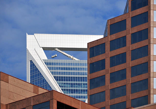Charlotte, North Carolina, USA: One Wells Fargo Center - designed by JPJ Architects - Duke Energy Center in the 2nd plan - South College Street - photo by M.Torres