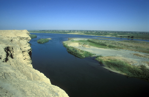 The Euphrates River between Aleppo and the border zom Iraq on the Euphrates River in the north of Syria in the Middle East.
