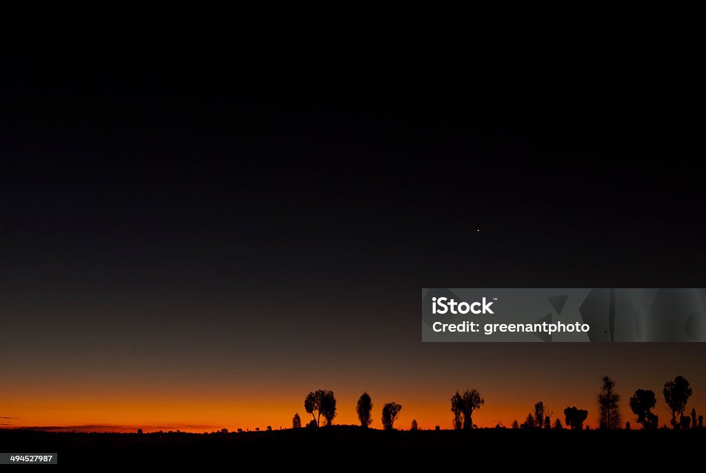 Last light in the desert, central Australia Taken near Uluru in the Northern Territory, Australia Uluru Stock Photo