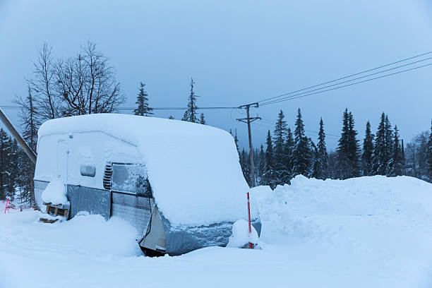 istock mobile caravan camper buried in winter snow 494528023