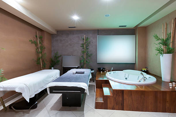 istock Massage tables and hot tub in spa 494529109