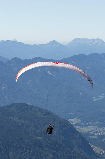 istock Paraglider over Austrian Alps with Karwanken Range on background 494529637