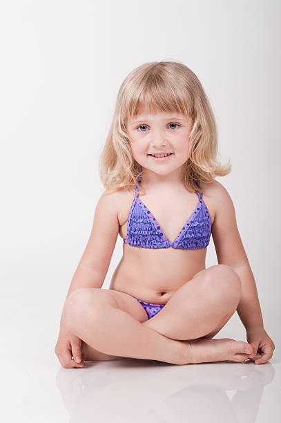 istock Cute girl wearing swimsuit 494529843