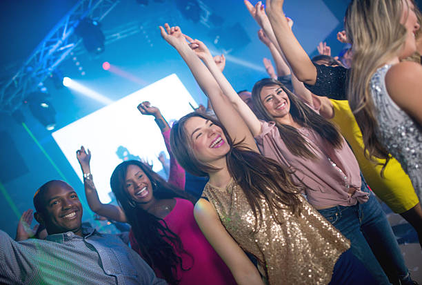 istock Group of people dancing at a nightclub 494532934