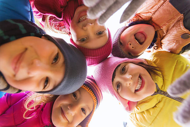istock group of happy children faces in circle 494533196