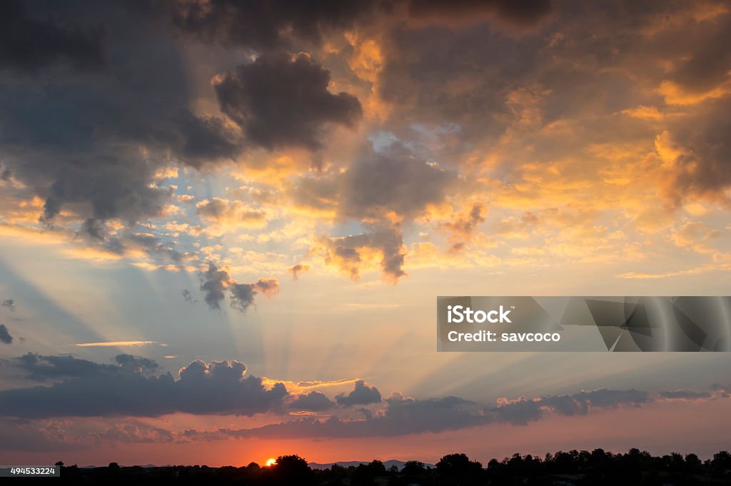 Beautiful sky at sunset Beautiful sunset clouds and rays at sunset 2015 Stock Photo